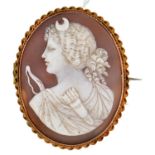 A cameo brooch, late 19th c, the oval shell carved with Diana,  gold mount marked 9ct,  9.5g Good