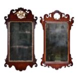 A Victorian parcel gilt mahogany fretted frame mirror, in George II style, crested by a Ho-Ho