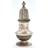An Elizabeth II silver sugar caster and cover, 16cm h, by William Comyns and Sons Limited, London