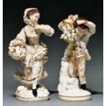 A pair of Derby figures of a boy and girl as Winter and Autumn from the set of the Four French