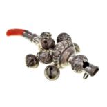 A Victorian silver child's rattle, hung with seven bells, coral teether, 90mm l, by George Unite,