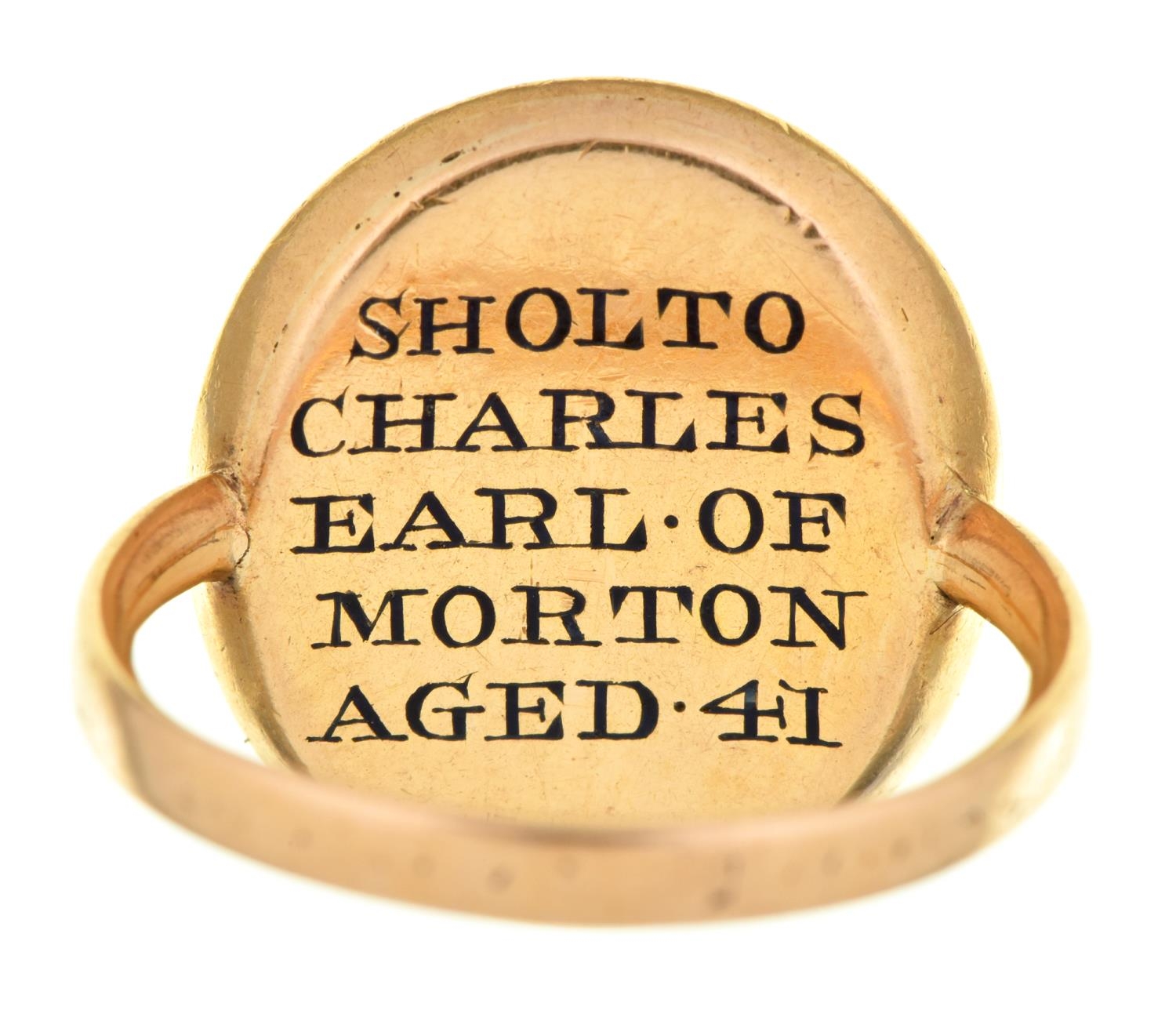 A gold and enamel mourning ring, 1774, inset with hair, the reverse enamelled in black SHOLTO