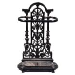 A cast iron stick stand, 20th century, in Victorian style, detachable drip tray, 51cm high Black