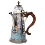 A George I silver chocolate pot, the detachable, domed lid with hinged finial, on flared foot,