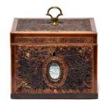 A George III mahogany, line inlaid, quilled paper and mirror inset tea caddy, late 18th c, with