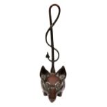 A Victorian brass fox head and whip door stop, mid 19th century, lead-weighted, 42cm high