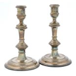 A pair of Elizabeth II silver candlesticks in Queen Anne style, 20cm h, by William Comyns & Sons,