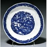 A blue printed pearlware saucer dish, c1790, with a full Nankin type pattern, 18cm diam Good