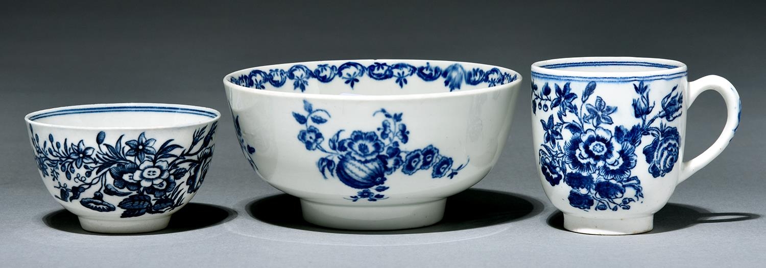 A Worcester bowl, coffee cup and tea bowl, c1780, transfer printed in underglaze blue with the Three