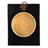 A George III memorial uniface or cliche medal, c1820, giltmetal, 70mm, papier maché frame