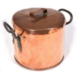 A Victorian cylindrical copper pan and cover, 30cm h, with early replacement iron loop handle, cover