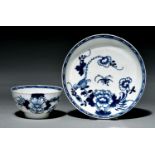 A Liverpool tea bowl and saucer, Philip Christian, c1770, painted in underglaze blue with the Bird