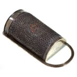A George III silver nutmeg grater, with reeded frame and steel rasp, integral hinge, crested, 10cm