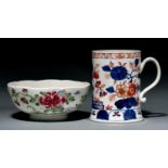 A Bow polychrome bowl and Imari mug, c1755, the bowl painted in famille rose style with trailing