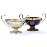 A pair of George III oval silver sauce tureens or butter boats, on cast foot, engraved with