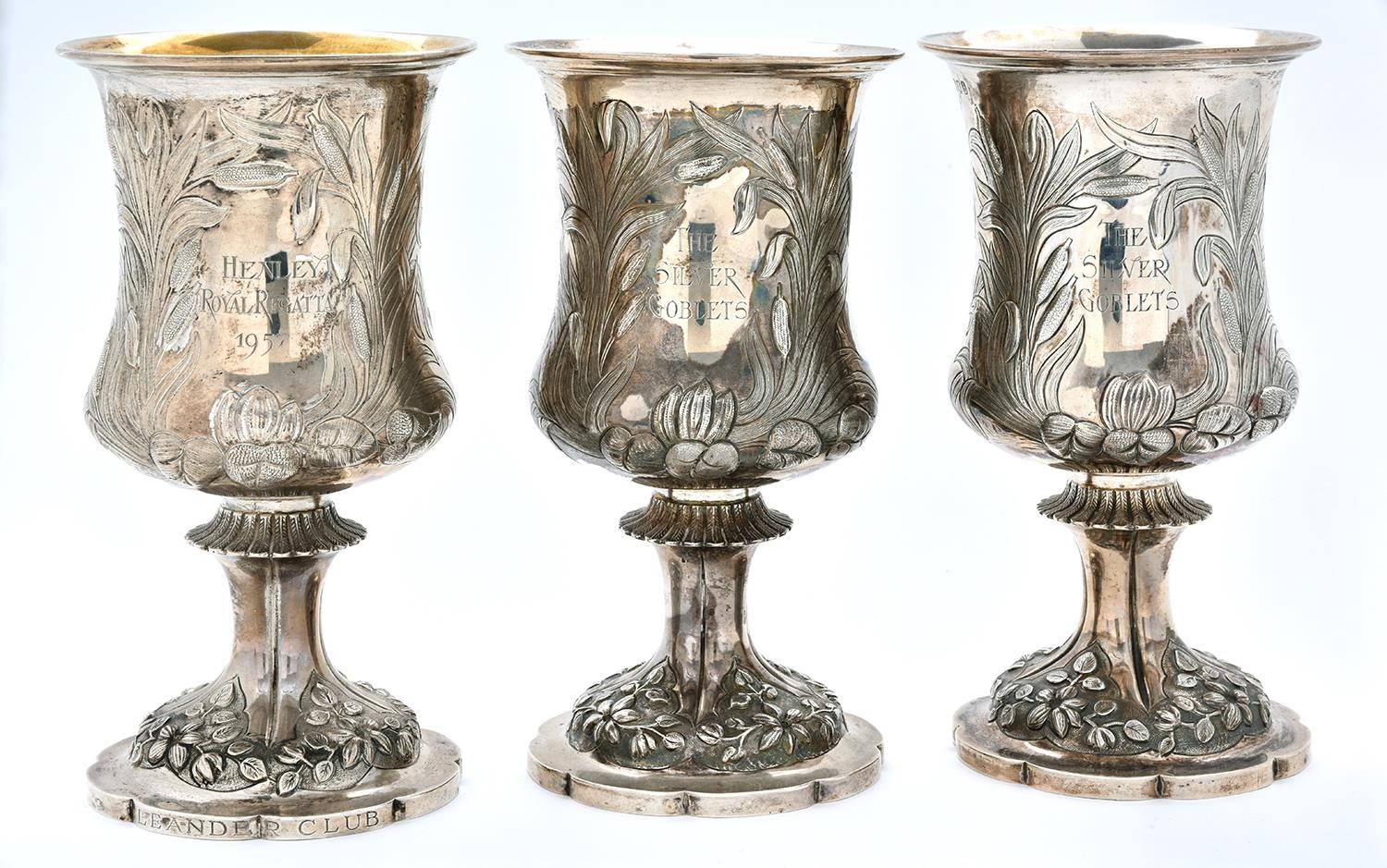 The Henley Royal Regatta Silver Goblets. Three Elizabeth II rowing prizes, chased with lilies and