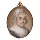 Abraham Daniel (c1760-1803) - Portrait Miniature of a Lady in a white mob cap tied with a ribbon,