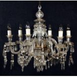 A six branch glass chandelier, 20th century, with festoons hanging from rings and pendants from