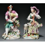 A pair of Derby figures of mandolin and bagpipe players, c1770, the lady with pink cap, turquoise