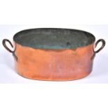 A Victorian oval copper pan, with loop handles, engraved T B, 19cm high, 53cm over handles