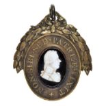 A George III silver gilt Pitt Club member's badge, 1806, centred by an oval glass paste cameo of