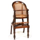 A Victorian mahogany and caned child's high chair and stand, mid 19th c Elements replaced; restored