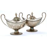 A pair of George III neo classical silver sauce tureens and covers, with vase finial, engraved
