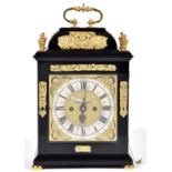 An English basket top ebony clock, Henry Massy London, c1700, the brass dial with matted centre,