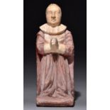 An English alabaster tomb figure of a kneeling woman at prayer, 16th century, her hair swept back