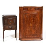 A George III oak hanging corner cupboard, early 19th c, the crossbanded door with shell patera, a