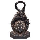 A Victorian cast iron lion’s head doorstop, mid 19th century, 30cm high Provenance: Miss Elizabeth