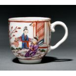 A Bristol polychrome coffee cup, c1775, painted in famille rose style with two reserves of Chinese