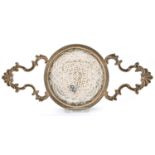 A George III silver orange or lemon strainer, the bowl symmetrically pierced below the beaded rim,