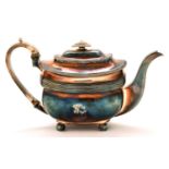 A George III silver teapot, of gadrooned oblong shape on ball feet, 16cm h, by Rebecca Emes and