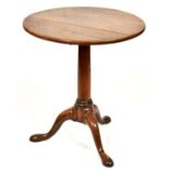 A George II mahogany tripod table, mid 18th c, with turned pillar, 71cm h x 64cm diam Provenance: