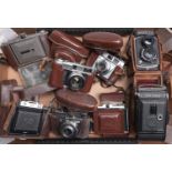 Eight various roll film cameras, comprising a Wagoflex twin lens flex, Zeiss Ikon Nettar, Ensign and