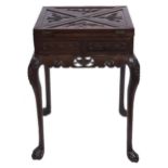 A Chinese carved hardwood card table, early 20th c, the 'envelope' top with four fold-over