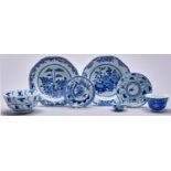 Two Chinese export octagonal blue and white soup plates, a cup, two saucers and two bowls, late 18th