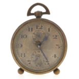 A Zenith brass alarm timepiece, No 23874 Apparently working order, dial discoloured