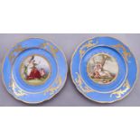 A pair of Continental porcelain blue ground cabinet plates, late 19th c, printed and painted with