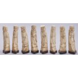 A set of Chinese carved bone figures of the eight immortals, 20th c, affixed shaped wood base,