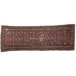 An antique red ground runner - 95 x 287cm Localised wear