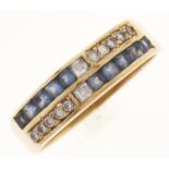 A tanzanite and white stone ring, in 18ct gold, 4.8g, size Q Good condition