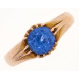 A blue paste ring, in gold, 2.76g, size N Light wear