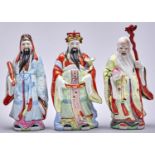 Three Chinese porcelain figures of immortals, 20th c, 38cm h and circa Good condition