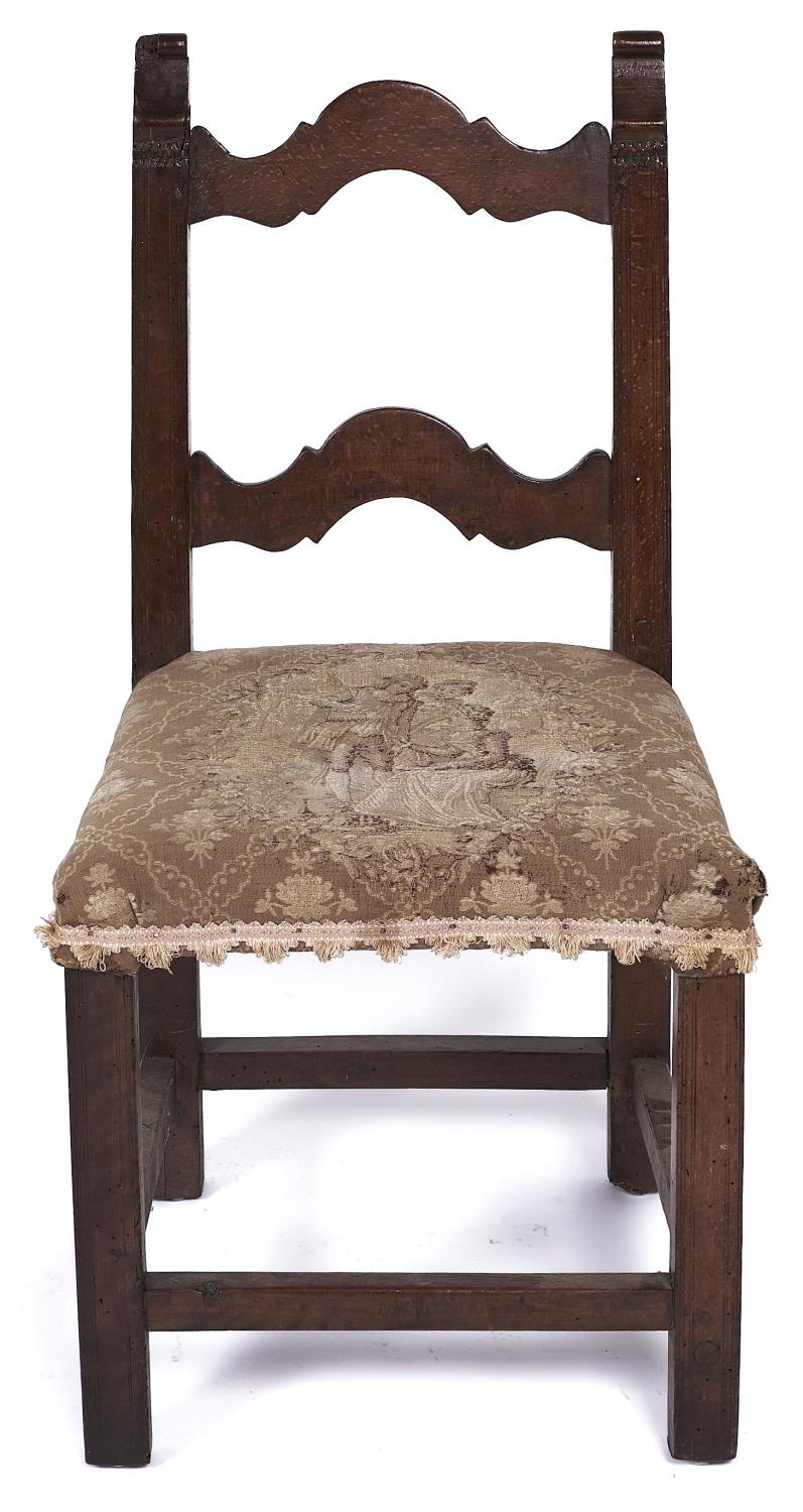 A Spanish walnut side chair, late 17th / 18th c, with arched top and back rails, seat height 41cm