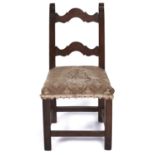A Spanish walnut side chair, late 17th / 18th c, with arched top and back rails, seat height 41cm