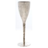 Stuart Devlin. An Elizabeth II parcel gilt champagne flute, the underside of the foot engraved