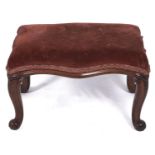 A Victorian serpentine walnut stool, on cabriole legs, 39cm h; 42 x 61cm Velvet seat covering