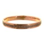A 9ct gold bangle, 74mm, Chester 1922, 16.8g Dented